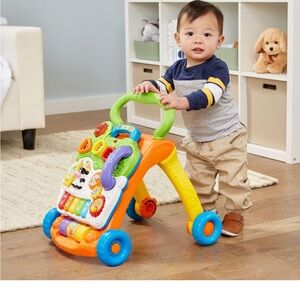 V Tech Sit to Stand Learning Walker - Brand New With Box!